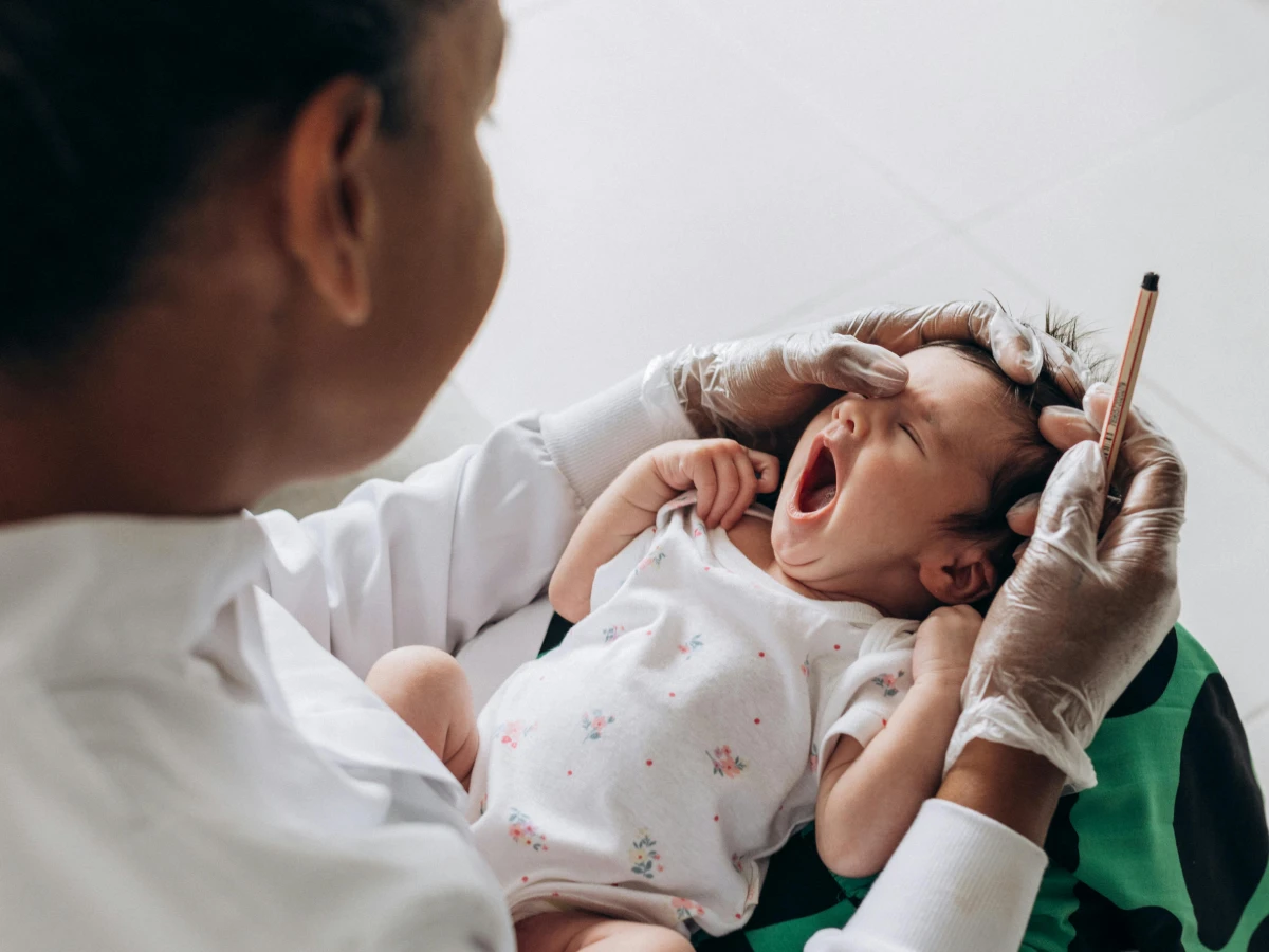 Midwife holding a newborn